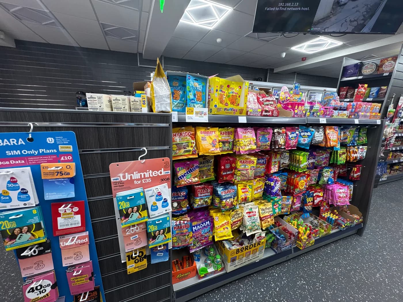 The two low displays near the entrance hold snacks and confectionery. Here’s the real view of those shelves.